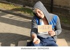 homeless-man-sign-help-begging-260nw-2659421455.jpg