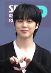 Jimin_on_the_way_to_SBS_Radio,_31_March_2023_(2).jpg