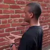 man-talking-to-wall.webp