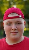 portrait-fat-smiling-teenager-red-260nw-1778607959.jpg