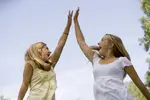 teenage-girls-high-five-5348046.webp