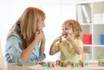 cute-kid-little-boy-speech-therapist-office-child-104345064.webp