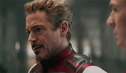 robert downey jr. is playing iron man in avengers : endgame and talking to another man .