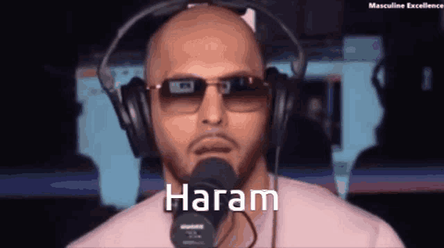 a man wearing headphones and sunglasses is talking into a microphone that says haram