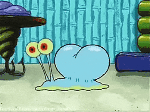 a cartoon character from spongebob squarepants is crawling on the sand