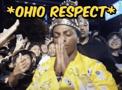 a man wearing a crown is praying in front of a crowd with the words  ohio respect  above him