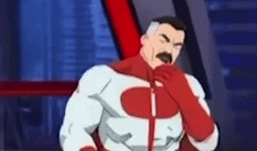 a cartoon character in a red and white superhero costume is standing in front of a building .
