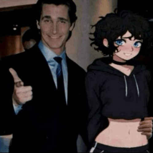 a man in a suit and tie is giving a thumbs up next to a woman in a crop top