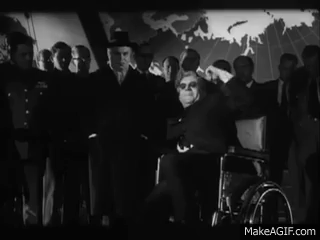Dr. Strangelove (1964) Dr. Fantástico - Peter Sellers fighting against his  nazi arm on Make a GIF Dr. Strangelove (1964) Dr. Fantástico - Peter Sellers fighting against his  nazi arm on Make a GIF