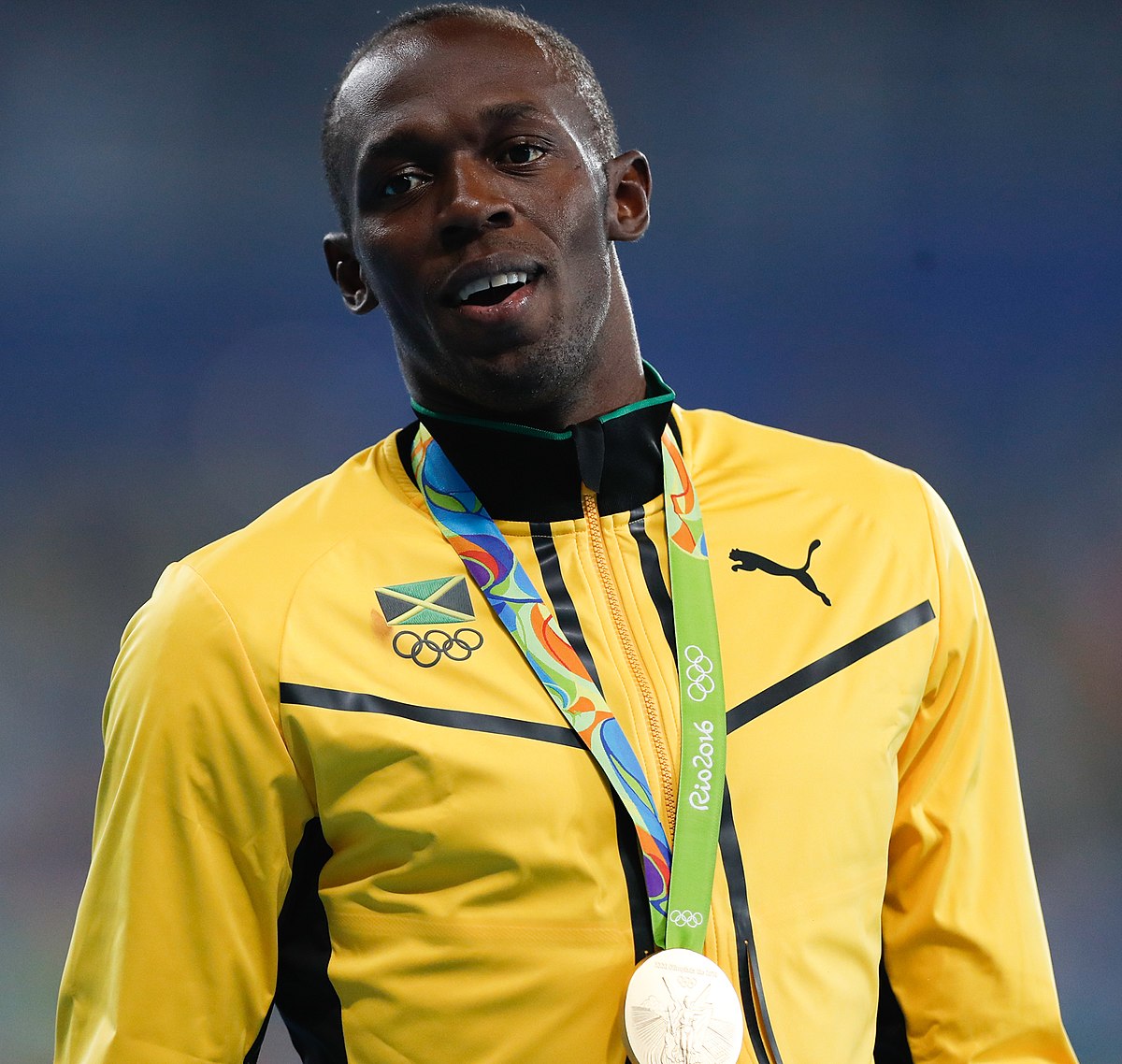 1200px-Bolt_se_aposenta_com_medalha_de_ouro_no_4_x_100_metros_1039118-19.08.2016_frz-9565_%28cropped%29.jpg